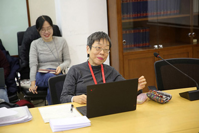 Prof. Angela Ki Che Leung in discussion with trainees